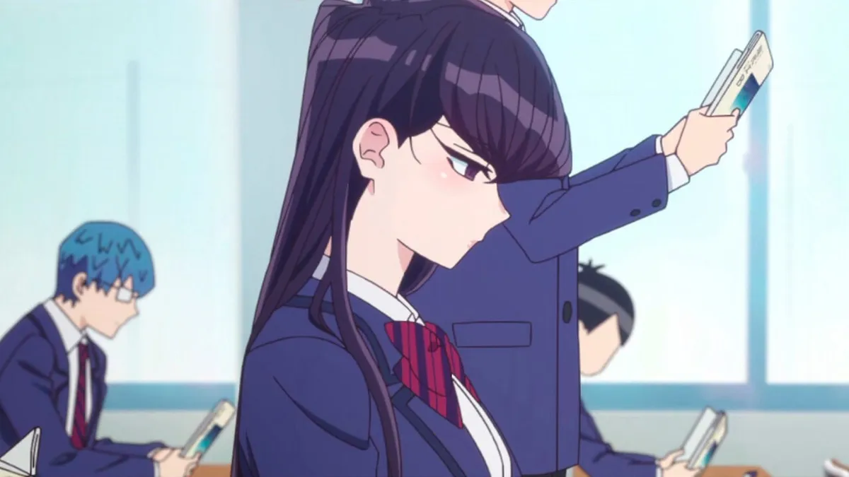A high school girl sits silently at her desk in "Komi Can"
